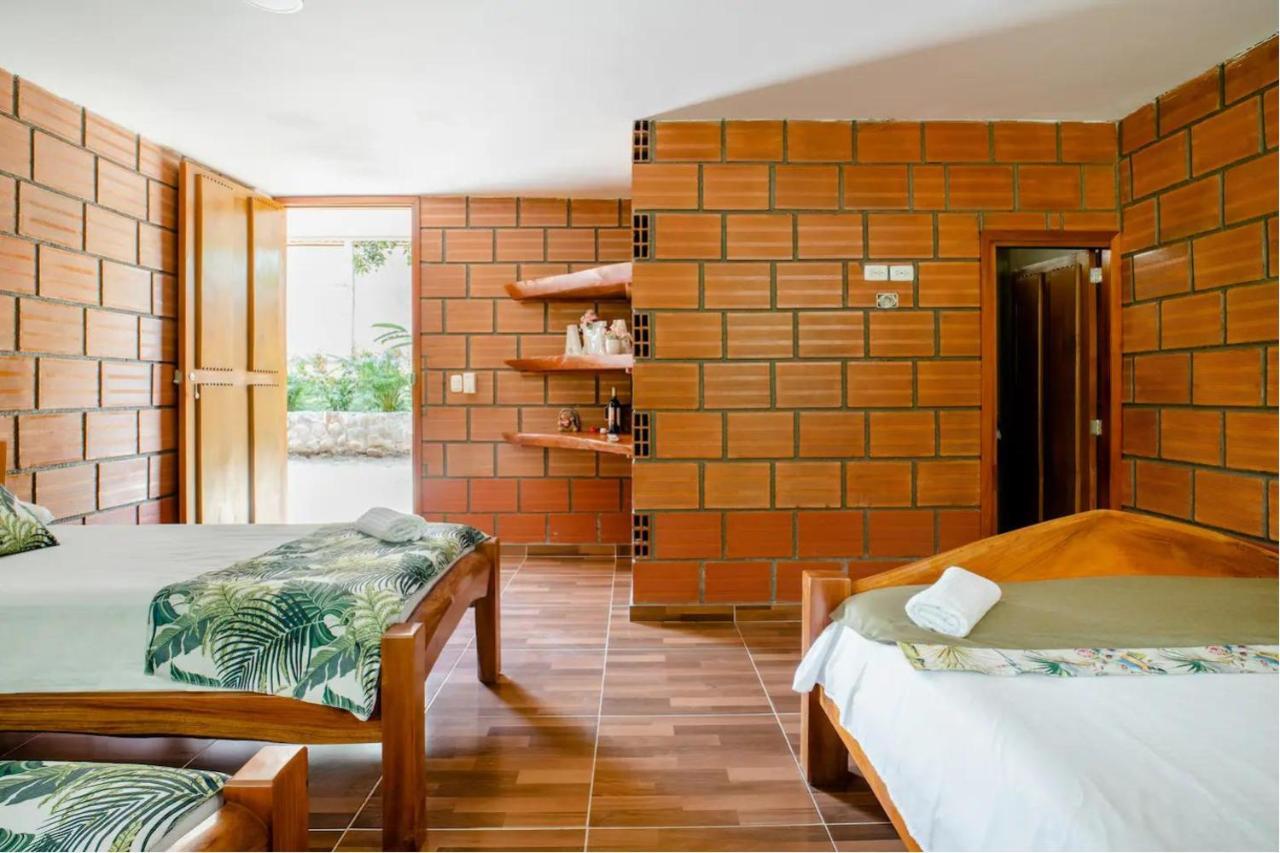 Arca Tayrona Restaurant & Hostal Los Naranjos Kültér fotó