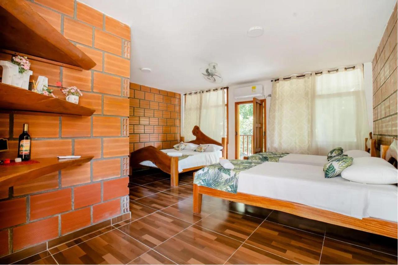 Arca Tayrona Restaurant & Hostal Los Naranjos Kültér fotó